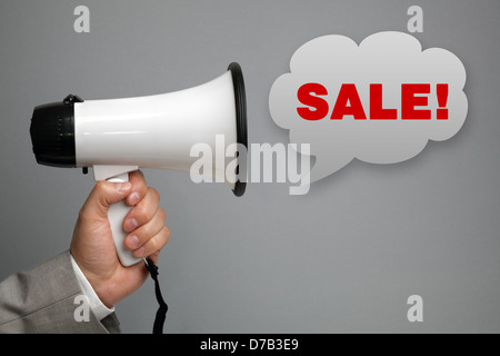 Megaphone shouting sale message Stock Photo