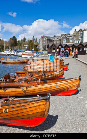 Rowing boats by the side of Lake windermere at Bowness on windermere Cumbria Lake district England UK GB EU Europe Stock Photo