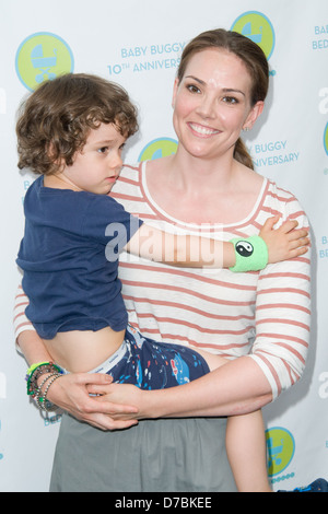 Erica Hill and son Weston Robert Yount Baby Buggy Bedtime Bash held at Wollman Rink in Central Park - Inside Arrivals New York Stock Photo