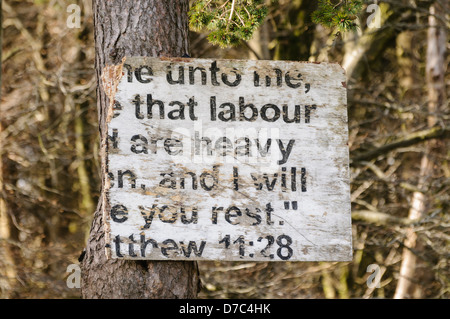 Broken religious sign typical of many erected in rural Protestant areas of Northern Ireland. Stock Photo