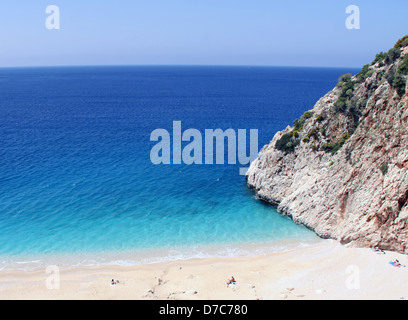 Sandy Beach and Blue Color Sea Stock Photo