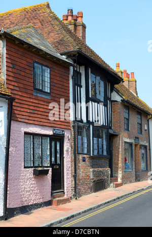 Houses and shops on the High Street, Alfriston, East Sussex, UK Stock Photo