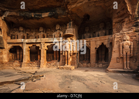 Rockcut Statues of Jain thirthankaras in rock niches near Gwalior fort. Gwalior, Madhya Pradesh, India Stock Photo