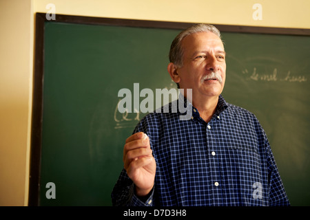 People and education, professor talking to students during lesson in college, Law School, University of Havana, Cuba Stock Photo