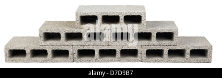 Six gray concrete construction blocks (a.k.a. cinder block breeze block cement block foundation block besser block; Stock Photo