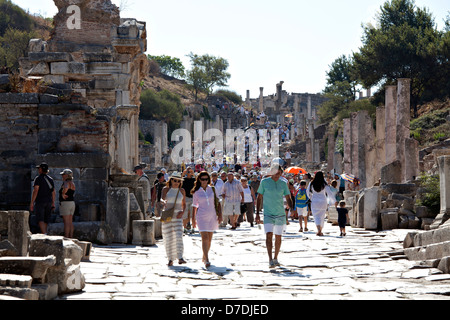 Tourists walking on Kuretes street in Ephesus, Izmir, Turkey Stock Photo