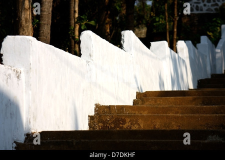 church stairs and white surrounding wall Stock Photo