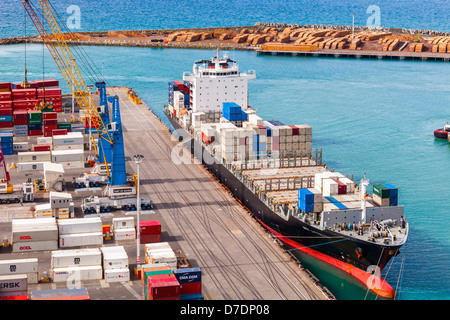 Container ship NYK Lyttelton at Napier Port, Hawke's Bay, New Zealand. Lots of containers on the dock... Stock Photo