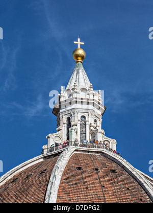 Florence, Italy - August 16, 2012: Tourists watch Florence from rooftops of Florence Duomo in Tuscany, Italy Stock Photo