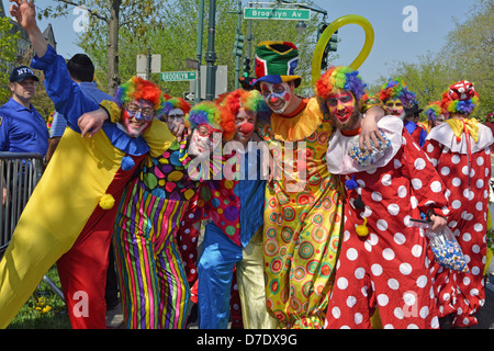 Religious Jewish men dressed as clowns at the Lag B'Omer parade in Crown Heights, Brooklyn, New York Stock Photo