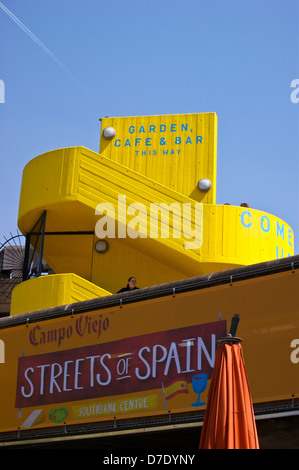 Yellow brutalist concrete staircase,  Campo Viejo Streets of Spain show, Royal Festival Hall, South Bank, London, England Stock Photo