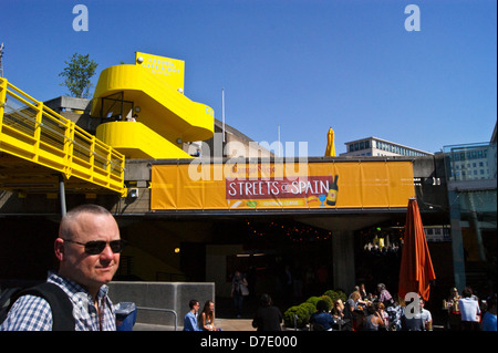 Yellow brutalist concrete staircase,  Campo Viejo Streets of Spain show, Royal Festival Hall, South Bank, London, England Stock Photo