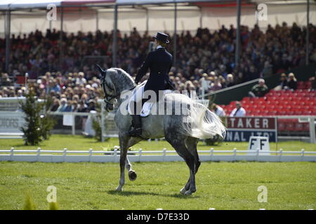 Badminton Estate, Gloucestershire, UK. May 4, 2013.  Dressage Day Two to FEI Eventing Four Star Dressage Test A. Tiana Coudray (USA) completing the Dressage Phase in equal 10th place on 43.3 Penalties riding Ringwood Magister. Credit Maurice Piper / Alamy Live News Stock Photo