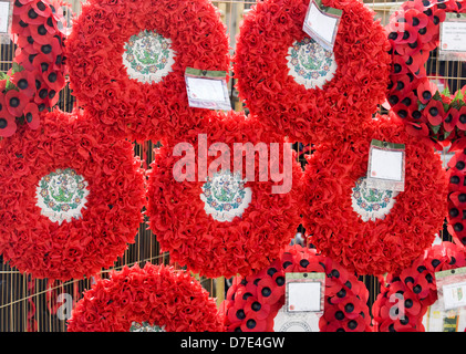 Poppy Wreaths on a gate outside 10 Downing Street London England Stock Photo