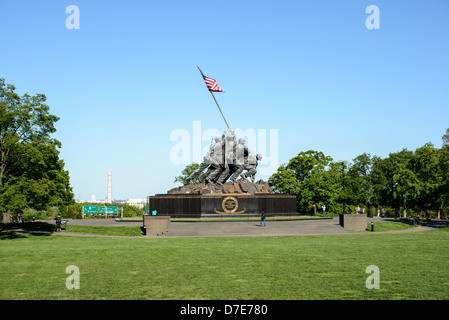 WASHINGTON DC, USA - A wide-angle shot of the western side of the Iwo Jima Memorial (formally the Marine Corps War Memorial) in Arlington, Virginia, next to Arlington National Cemetery.  In the background, to the left of the memorial, are the Lincoln Memorial, Washington Monument, and US Capitol Dome. The monument was designed by Felix de Wledon and is based on an iconic Associated Press photo called the Raising the Flag on Iwo Jima by Joe Rosenthal. It was dedicated in 1954. Stock Photo