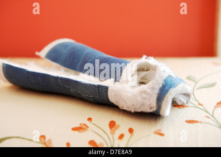 Empty child's cast that has been removed from arm. Stock Photo