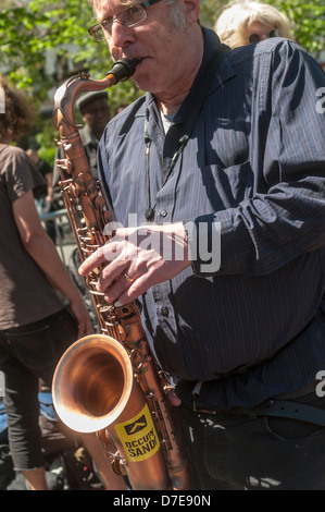 Occupy Wall Street activists make music in Union Square Park Stock Photo