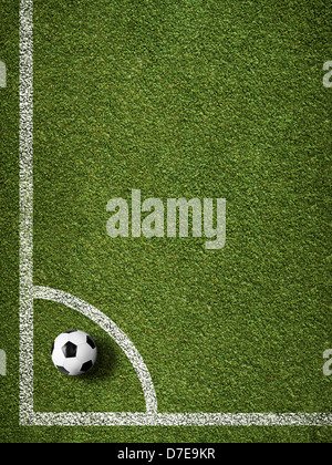 Soccer ball in corner kick position. Football field top view. Stock Photo