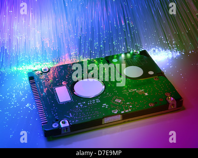 harddisk with fiber optical background Stock Photo