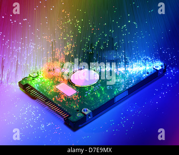 harddisk with fiber optical background Stock Photo