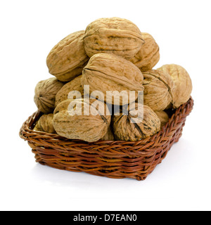 Walnuts in a Basket Isolated on White Background Stock Photo