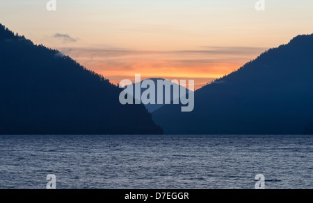 Sunrise over mountains and lake, Lake Crescent, WA Stock Photo