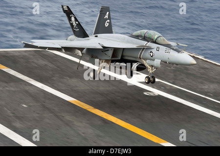 An F/A-18F lands aboard USS Dwight D. Eisenhower. Stock Photo