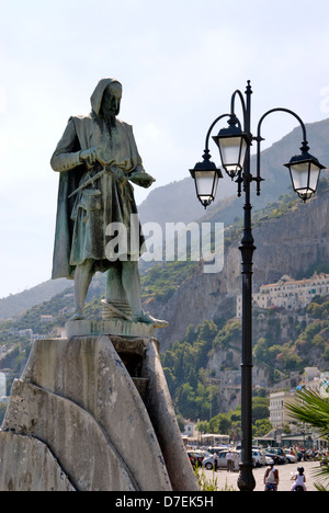 Amalfi. Campania. Italy. View of the statute of Flavio Gioia in the Piazza Flavio Gioia in the town of Amalfi. A merchant naviga Stock Photo