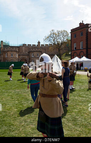 Lincoln, UK. 6th May, 2013. Victorian Weekend at Lincoln Castle in Lincolnshire Uk. People dressed in traditional Victorian The Home Guard (initially 'Local Defence Volunteers' or LDV) was a defence organisation of the British Army during the Second World War. of the era soldier aiming musket Credit: Paul Thompson/Alamy Live News Stock Photo