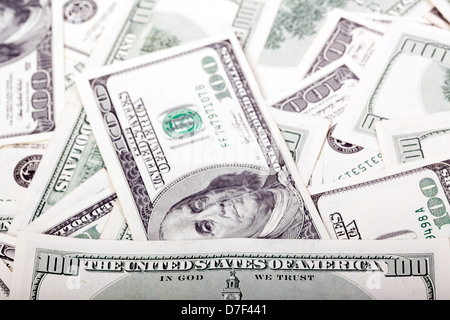An extreme macro shot 100 US$ money notes depicting writing 