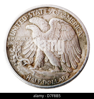 Frontal view reverse (tails) side silver half Dollar minted in 1942. Depicted is bald eagle rising from mountaintop perch. Stock Photo