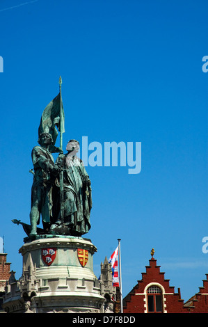 Statue of folk heroes Jan Breydel and Pieter de Coninck on the Grote Markt, Market square in the historic site of Bruges Stock Photo