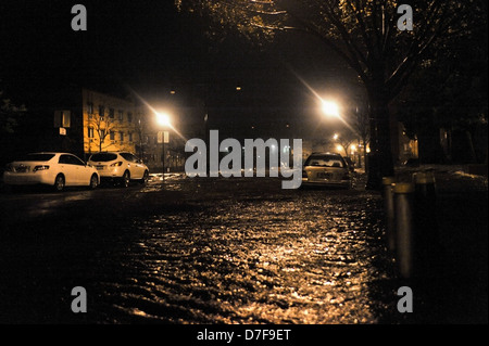 BROOKLYN, NY - OCTOBER 29: Flooded cars, caused by Hurricane Sandy, are seen on October 29, 2012, in the corner of Bragg street Stock Photo