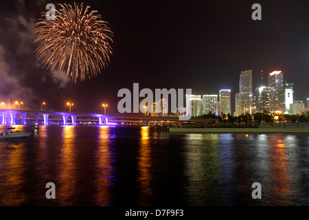 Miami Florida,Government Cut,Biscayne Bay water night,downtown city skyline Port Boulevard Bridge,July Fourth 4th,celebration,fireworks,burst,reflecti Stock Photo
