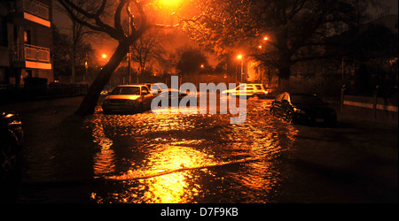 BROOKLYN, NY - OCTOBER 29: Flooded cars, caused by Hurricane Sandy, are seen on October 29, 2012, in the corner of Bragg street Stock Photo