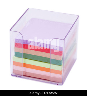 A colorful stack of notes inside a transparent plastic note holder ...