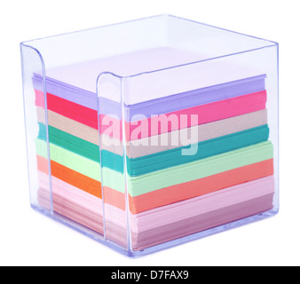 A colorful stack of notes inside a transparent plastic note holder ...