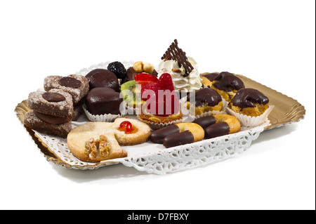 Colorful and mixed mini-cupcakes in little golden tray Stock Photo
