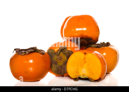 fresh persimmon fruit on a white background Stock Photo