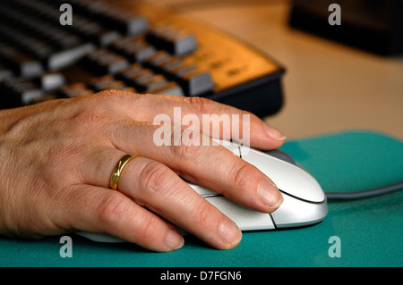 Computer, mouse, hand, keyboard, PC keyboard, hand on mouse Stock Photo