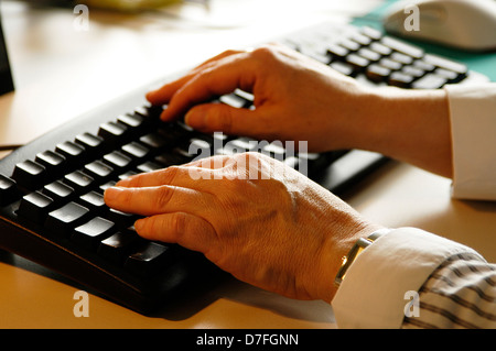 PC keyboard, hands on keyboard, tapping Stock Photo