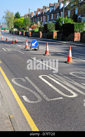 Maidstone, Kent, England, UK. Road signs and markings. Slow / keep left