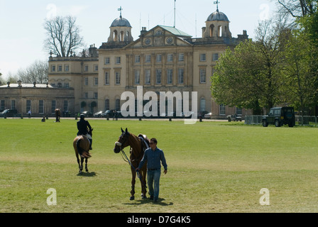 Badminton House competitors with their horses go to and from their stables. May 2013 2010s UK HOMER SYKES Stock Photo