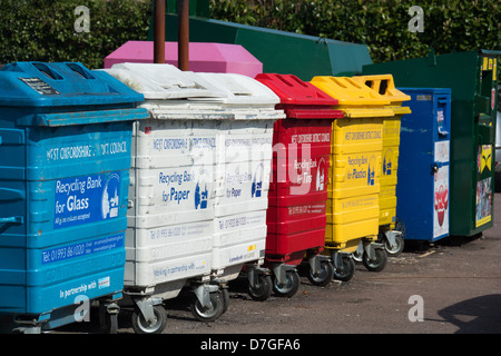 A public recycling bank, with colour-coded bins for different materials (glass, paper, tin, plastic). UK, 2013. Stock Photo