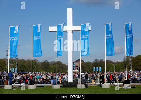 giant cross and flags at the open air sunday service of the 34th Evangelical Church Congress in Hamburg, Germany. Motto of the c Stock Photo