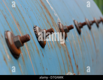 Screws in a row on a crusher mill, detail on mining equipment Stock Photo