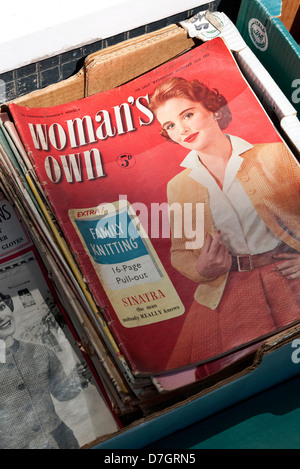 retro style woman's own magazine in cardboard box Stock Photo