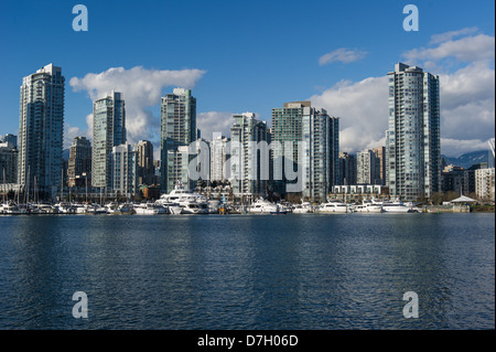 All the high end yachts in Marina side marina. The highrises are along marinaside drive in Vancouver .Vancouver,British Columbia Stock Photo