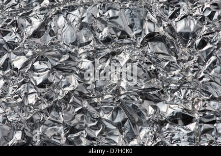 close up crumpled aluminum foil background texture Stock Photo