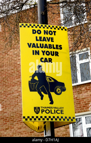 Police sign warning public not to leave valuables in their cars Stock Photo